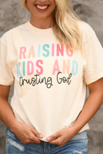 Load image into Gallery viewer, Raising Kids And Trusting God Tee